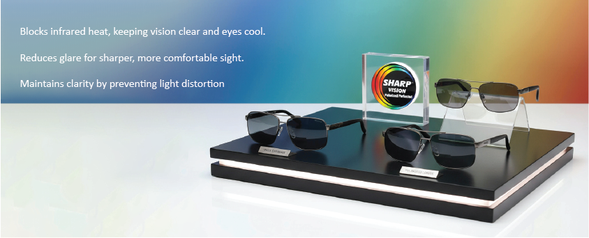 Sunglasses on a display stand with promotional text about vision clarity and glare reduction.